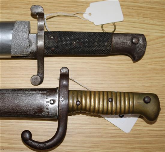 A British Enfield sword bayonet and a French Chassepot sword bayonet